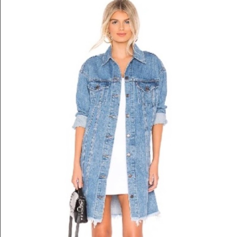 Levis X-long Trucker in Shorty denim jacket raw hem revolve